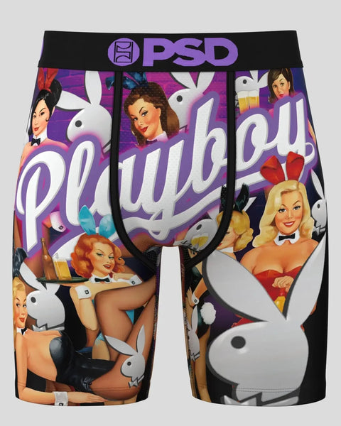 PSD boxer briefs with purple Playboy branding and vintage pin-up imagery featuring women and white bunny logos.