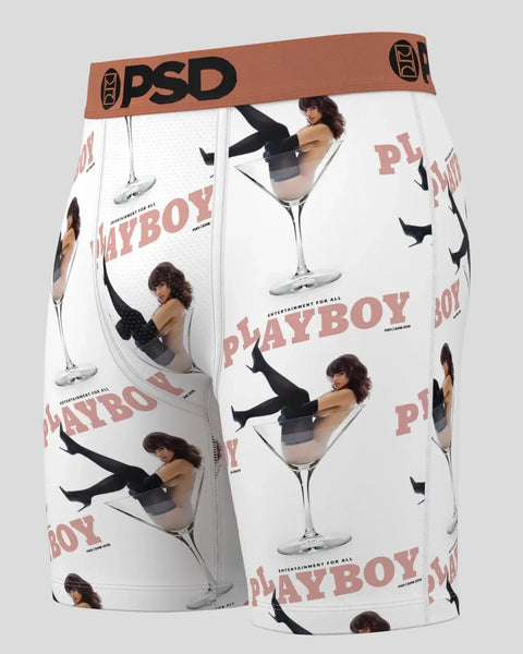 White briefs with PSD waistband featuring repeated Playboy martini and woman imagery in pink and black.