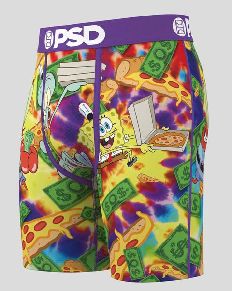 PSD brand boxer shorts featuring SpongeBob SquarePants with pizza, money, and tie-dye pattern on multicolor background.