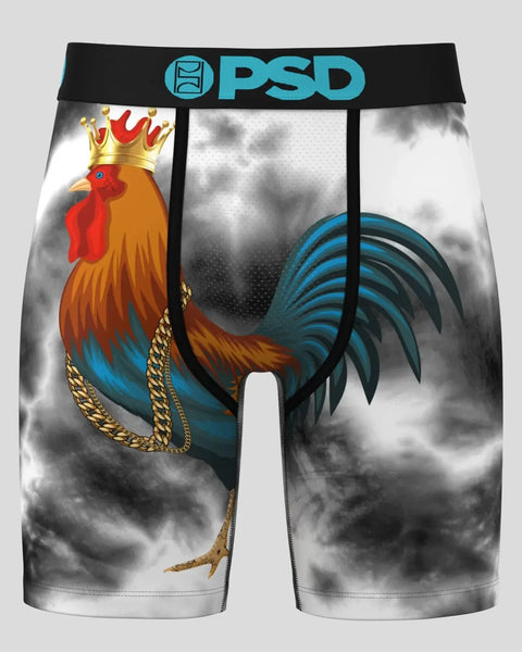 PSD boxer briefs with rooster graphic, gold chain design, and turquoise/black waistband on cloudy background.