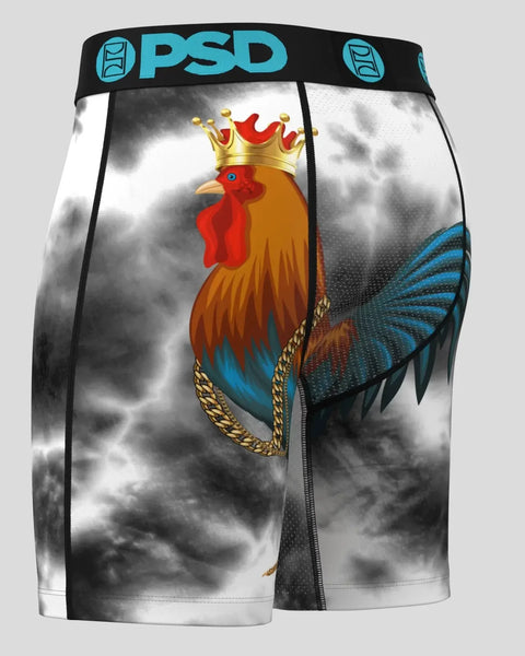 PSD boxer briefs with rooster wearing crown graphic and blue/turquoise waistband on cloudy background.