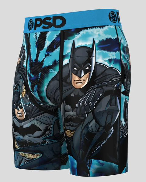 PSD brand blue boxer briefs with Batman character graphics and claw mark design.