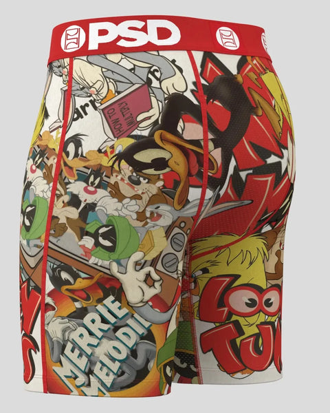 PSD brand boxer shorts with Looney Tunes characters including Bugs Bunny and Daffy Duck on cream and red background.