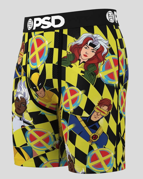 PSD brand shorts with yellow and black checkerboard pattern featuring X-Men characters and colorful logo symbols.