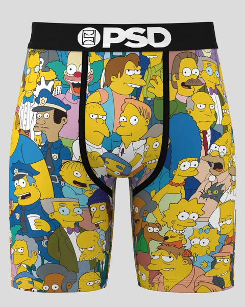 Men's boxer shorts with black PSD waistband featuring multiple yellow Simpsons characters and colored backgrounds throughout.