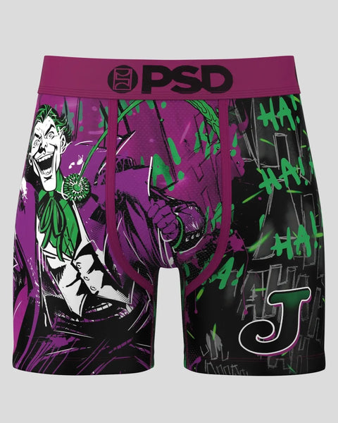 PSD brand shorts with Joker character design in purple, green, and black with 