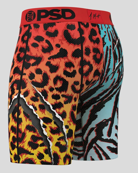 Red PSD boxer briefs with black leopard print, yellow and orange gradient sections, turquoise side panel, and white stripe de