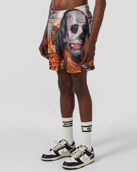 Men's athletic shorts with skull and flame graphic print in orange, black, and gray.