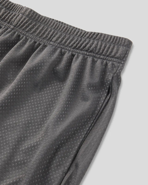 Charcoal shorts with textured dot pattern fabric, elastic waistband, and side pocket detail.