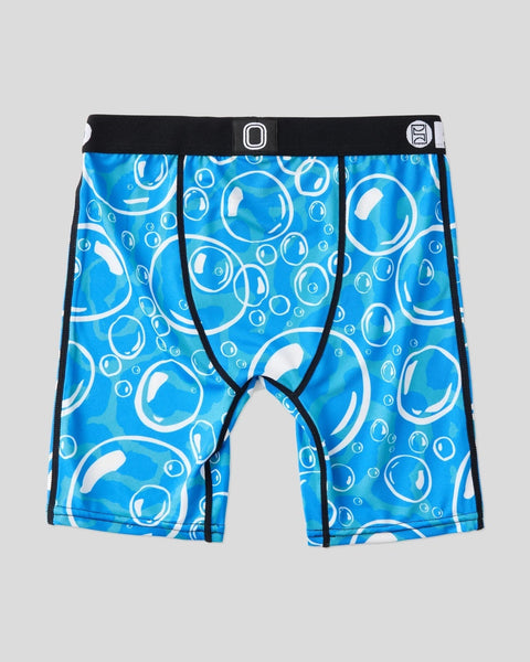 Blue boxer briefs with white bubble pattern, black waistband with Overtime logo, and black side seams.