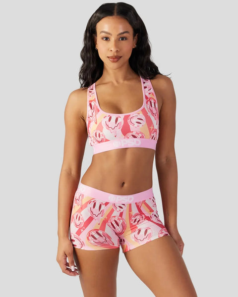 Pink two-piece swimsuit set with smiley face pattern and solid pink trim.