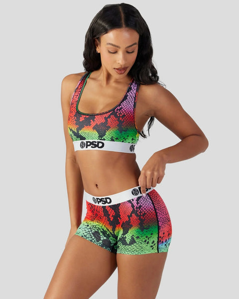 Colorful snake-scale patterned sports bra and shorts set with PSD branding and white waistband.