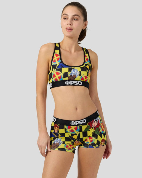 Woman wearing X-Men checkers pattern sports bra and shorts set with black PSD waistbands.