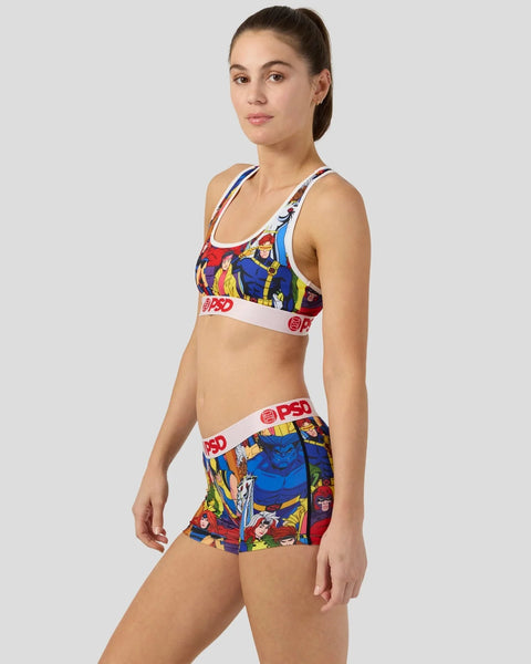 Woman wearing X-Men character print sports bra and matching shorts with white elastic bands.