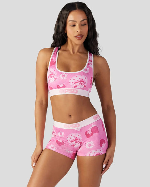Pink velour sports bra and shorts set with strawberry and floral print and white trim.