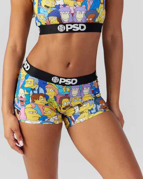 Two-piece swimwear set featuring colorful Simpsons characters with black PSD waistbands.
