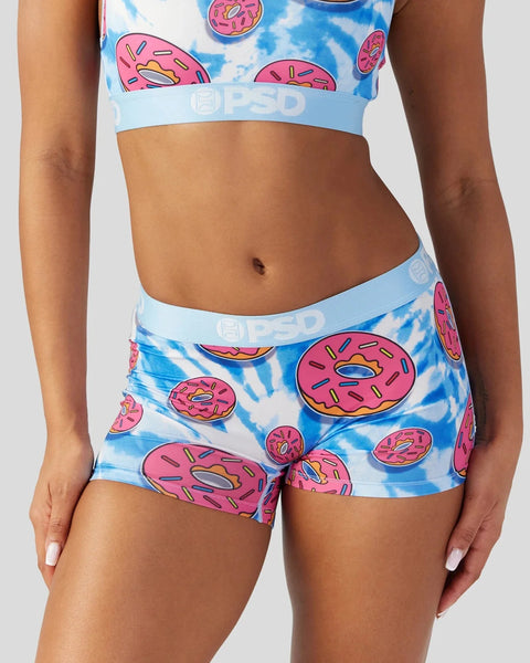 Two-piece swimsuit set with pink frosted donut print on blue tie-dye background, white waistbands with text.