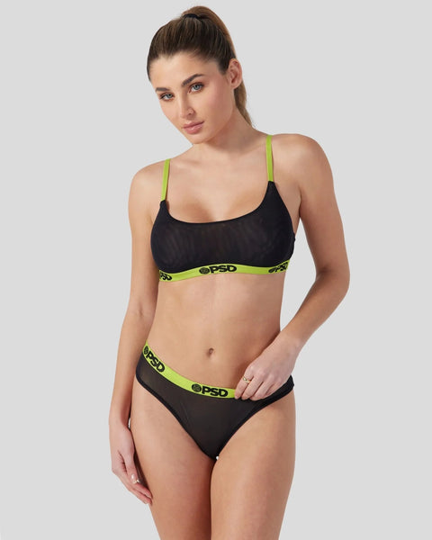 Black mesh sports bra and brief set with neon green straps and branded waistband trim.
