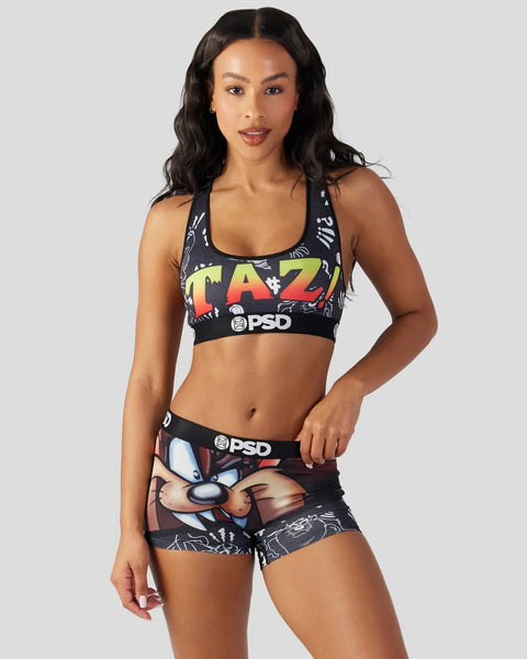 Black sports bra and shorts set with Tasmanian Devil graphic and PSD branding.
