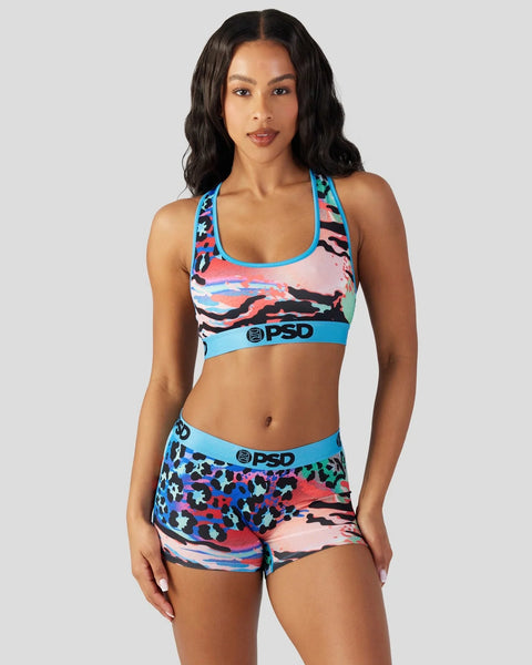 Colorful animal print sports bra and shorts set with blue trim and PSD branding.