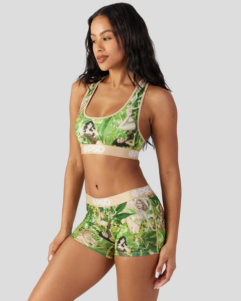 Green and cream two-piece athletic set with vintage portrait and foliage print, featuring racerback sports bra and matching s