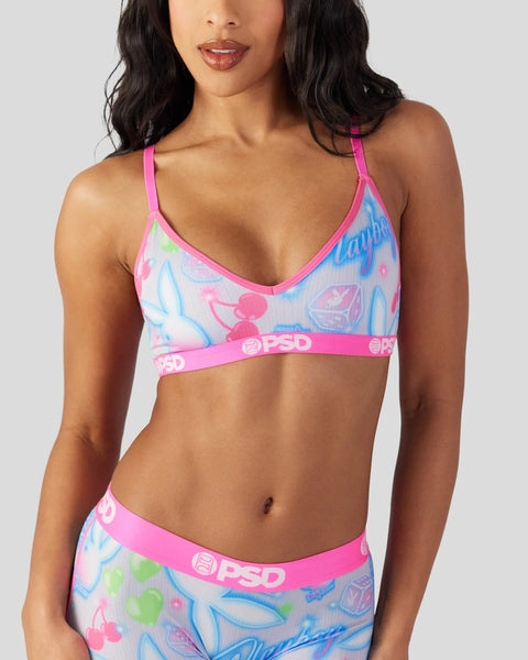 Pink and multicolor patterned bralette with matching waistband featuring PSD branding and adjustable straps.