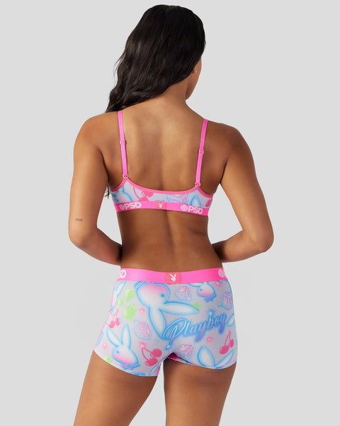 Pink and blue Playboy bra and shorts set with graphic print and adjustable straps, shown from back view.