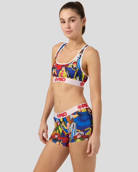 Woman wearing X-Men character print sports bra and shorts set with white elastic bands and PSD branding.