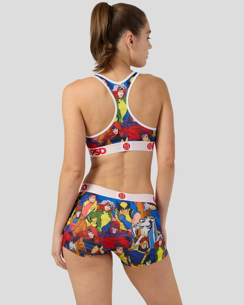 Woman wearing X-Men character print sports bra and shorts with white elastic bands.