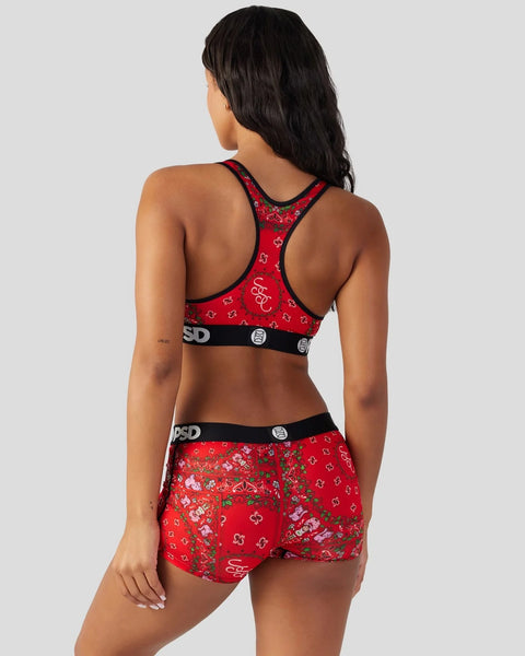 Red bandana with strawberry and floral print, black trim and branded waistband.