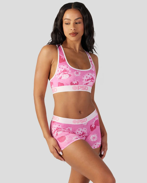 Pink velour sports bra and shorts set with strawberry and floral print, white waistband trim.