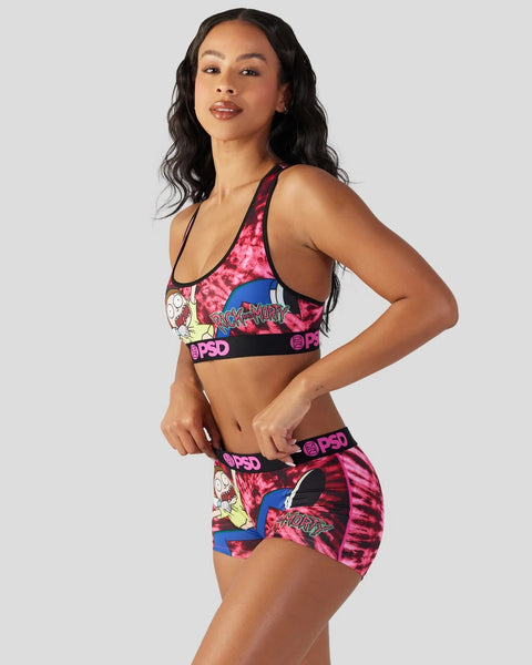Woman wearing Rick and Morty Warp sports bra and shorts set with pink tie-dye and character graphics.