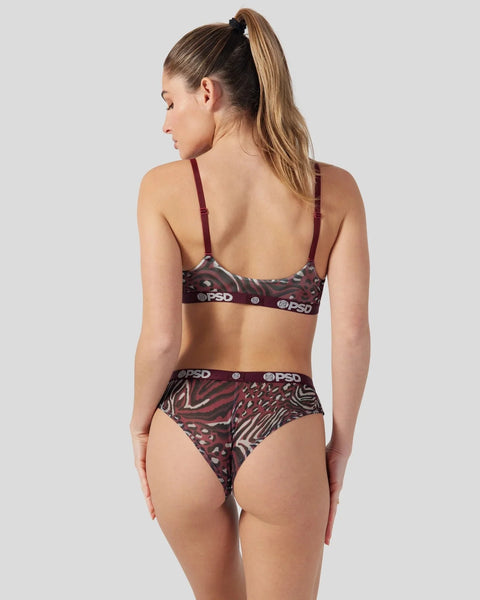 Woman wearing burgundy and black cheetah print mesh bralette and brief set with spaghetti straps, shown from back.