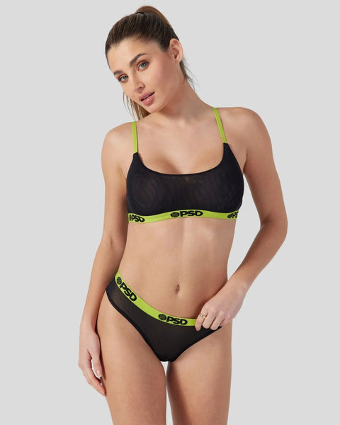 Black mesh bra and brief set with lime green straps and waistband trim.