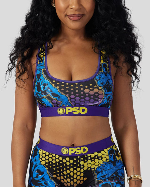 Black Panther sports bra with blue character graphic, yellow honeycomb pattern, and PSD waistband.