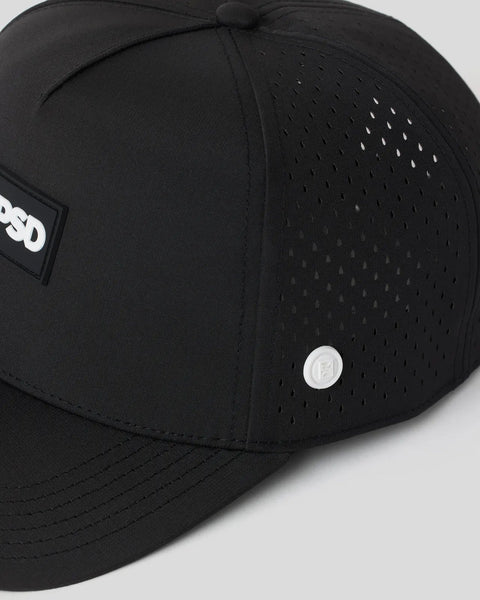 Black baseball cap with perforated back panels, white logo patch on front, and small circular emblem on crown.
