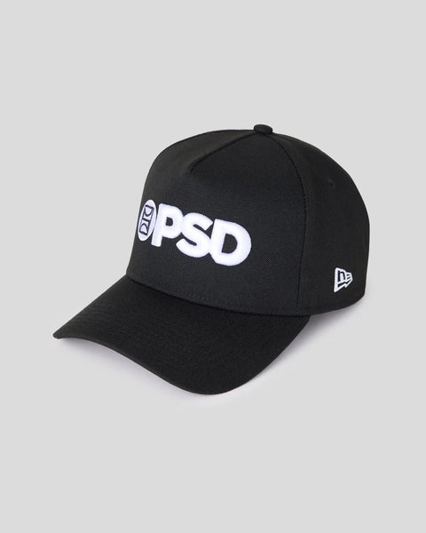 Black baseball cap with white PSD logo on front and New Era logo on side.