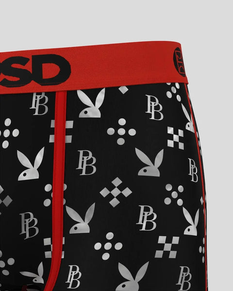 Black and white Playboy monogram pattern with bunny heads and geometric shapes on red-waistband briefs.