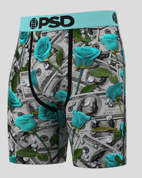 PSD boxer briefs with teal waistband featuring teal roses, green leaves, and dollar bill pattern on gray background.