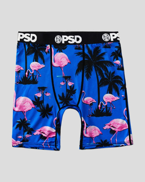 Three PSD boxer briefs with blue background, pink flamingos, and black palm tree silhouettes throughout.