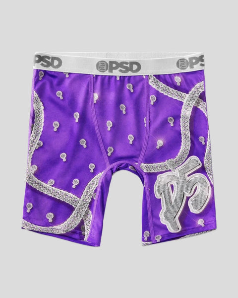 Purple boxer briefs with gray waistband, gold scattered pattern, silver trim, and white graphic design on leg.