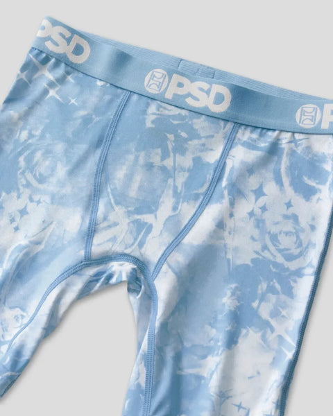 Blue and white tie-dye patterned briefs with PSD brand waistband and rose motif print.