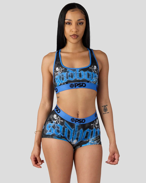 Blue and black two-piece athletic set with skull graphics, blue straps, and PSD waistband branding.