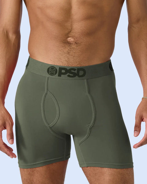Forest green boxer briefs with PSD waistband and contrast stitching details.