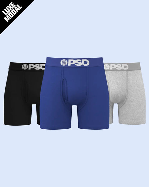 Three PSD modal briefs in black, blue, and gray with branded waistbands.