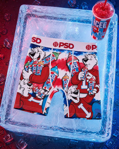 PSD brand underwear with ICEE mascot print in red, white and blue, displayed in ice tray with red ICEE drink.