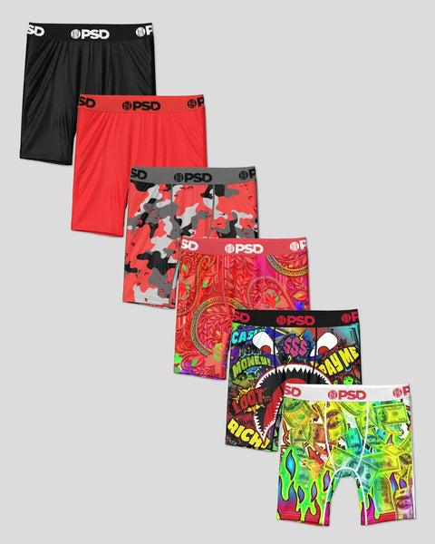 Six PSD boxer briefs in black, red, red camo, red paisley, colorful graphic, and neon money print designs.