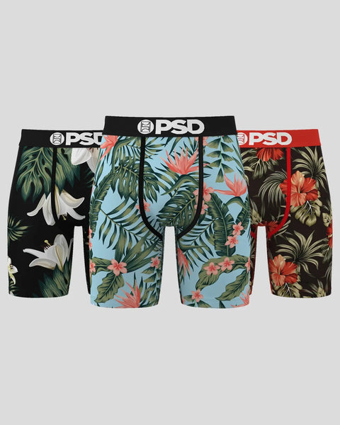 Three PSD boxer briefs with tropical floral and leaf prints in black, light blue, and dark brown colorways.