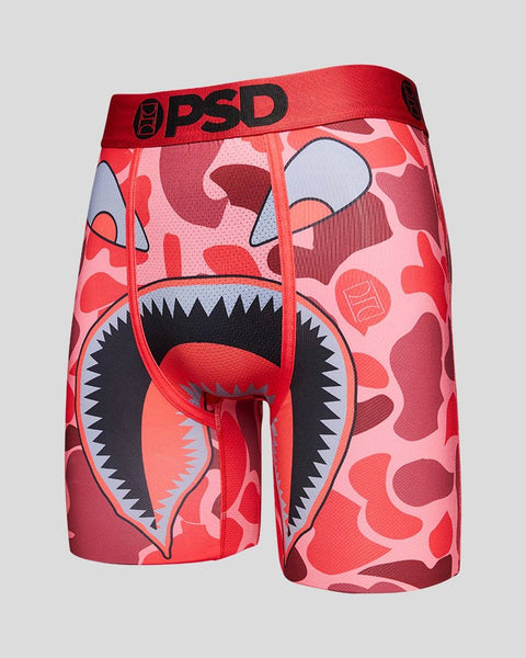 Red camo boxer briefs with cartoon face design featuring open mouth and sharp teeth.