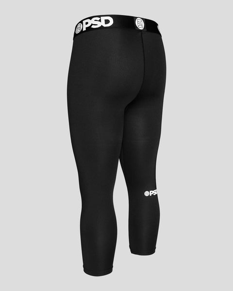 Black PSD Pro Tight 3/4 compression tights with branded waistband and leg logos.